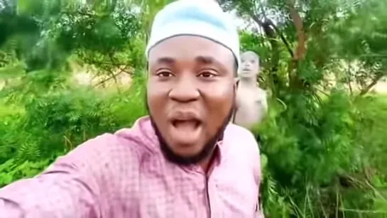 African guy running from tribe member