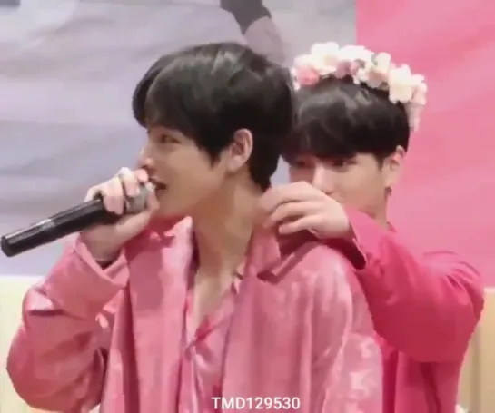 Jungkook suddenly found taehyungs nape interesting and started playing with his collar - -