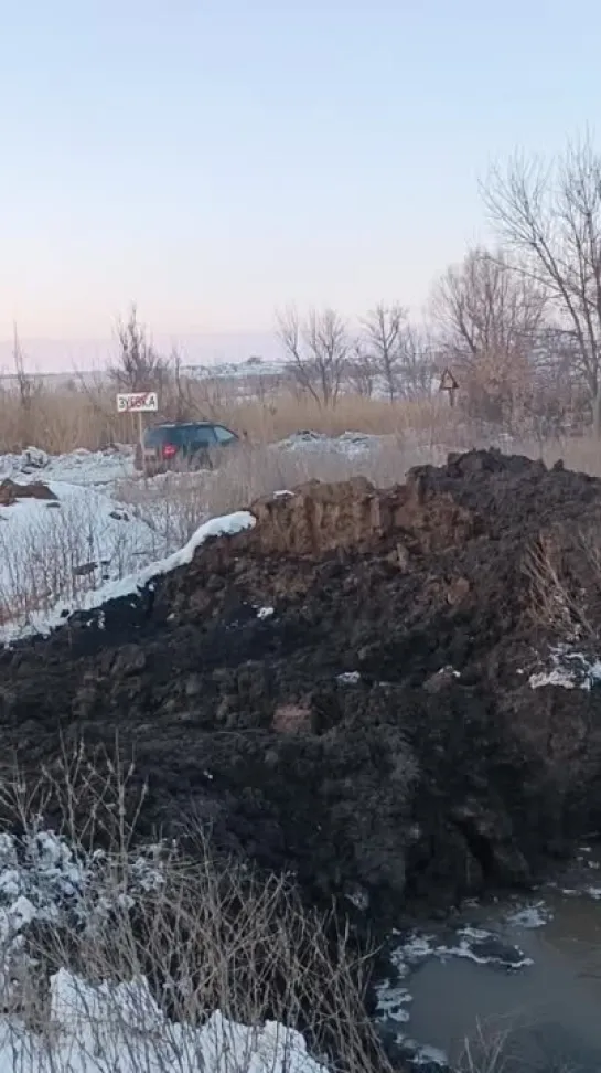 Выезд на Ждановку почистили. Воду отвели в старое русло