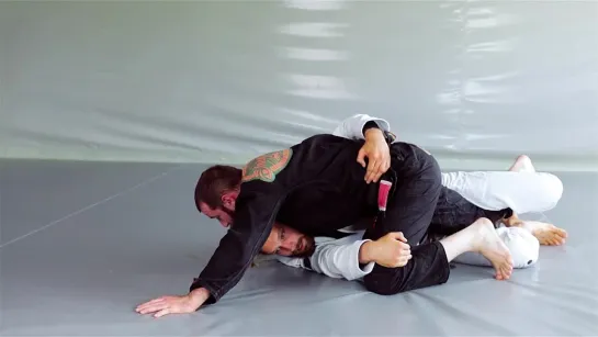 3 Adam Wardzinski - Half Butterfly Guard - Sweeps Options Against Overhook Control