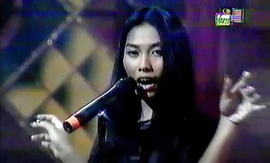 Anggun on TV 1998  "Snow On The Sahara" & "A Rose In The Wind"