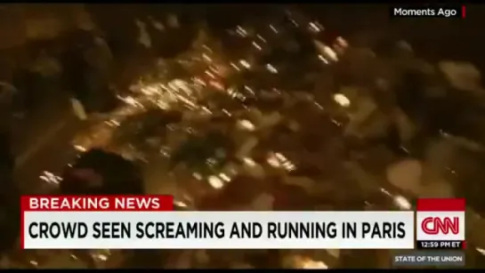 Crowd seen screaming and running from Paris memorial