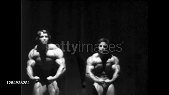 01 January, 1975 (Arnold Schwarzenegger posing with Franco Columbu on stage)