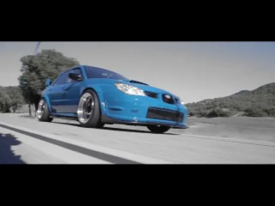 Laguna Seca blue Subaru STI [Third World Society]