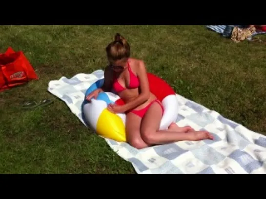 Alissa deflating my big beach ball