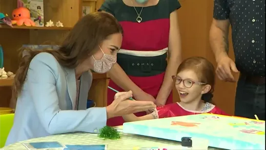 Little Girl Paints Kates Hand at Childrens Hospice