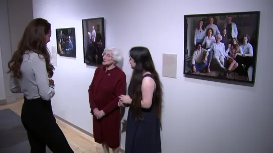 Kate hugs holocaust survivors at Imperial War Museum