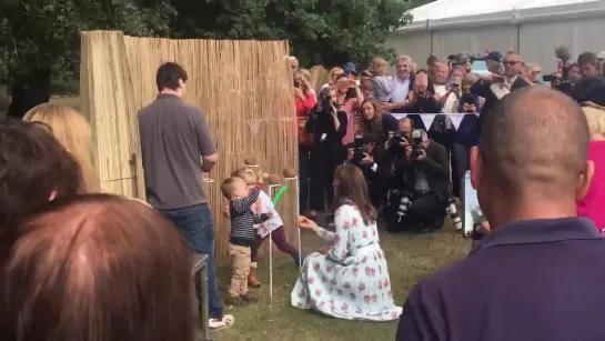 Kate playing with some children